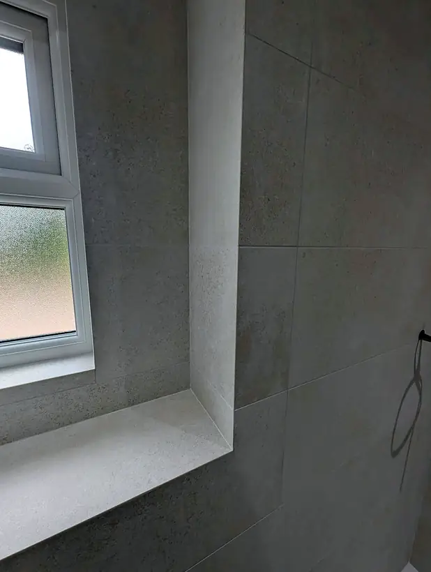 Mitred window reveal and sill